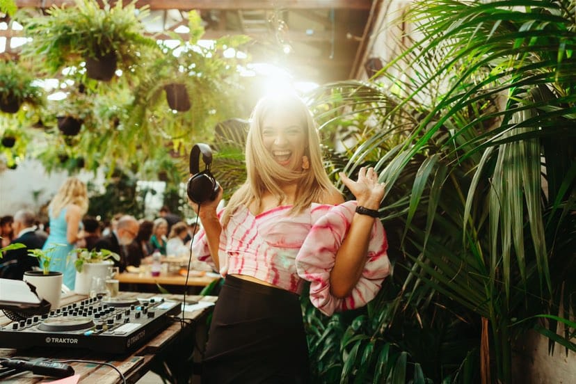 DJ and Celebrant Aleks Mac Behind the Decks at Glasshaus Photographed by Jackson Grant